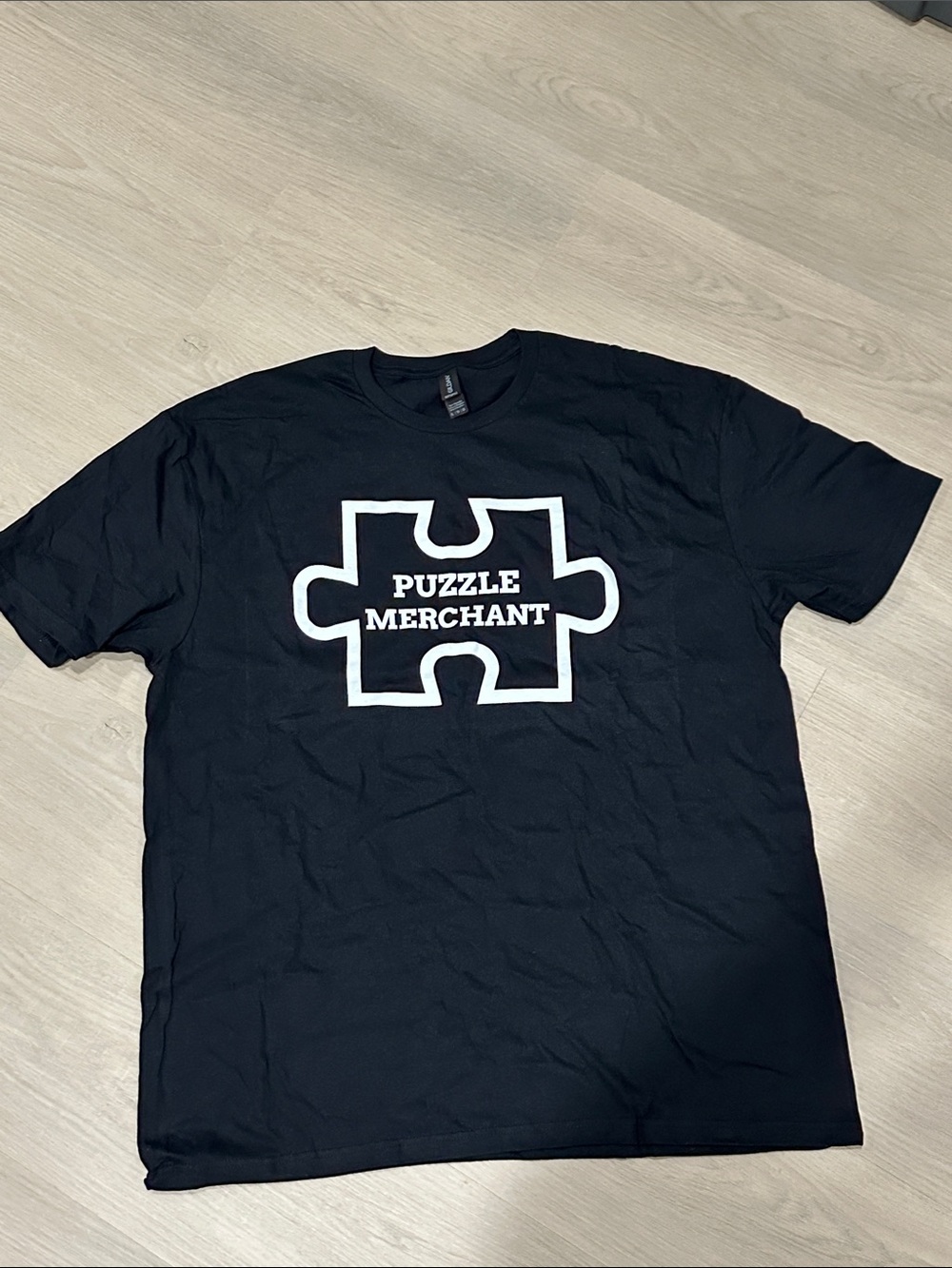 Puzzle Merchant Black T-Shirt-  Brand New